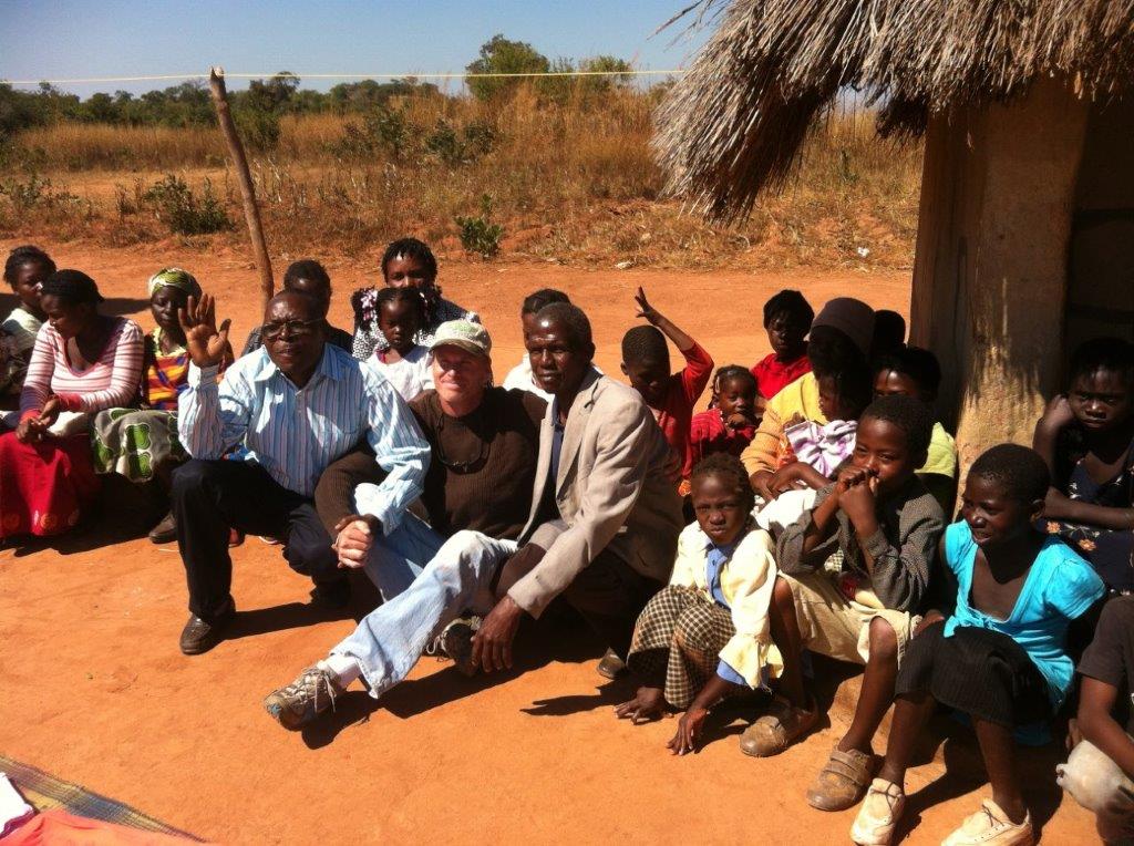 John 414 Missions Chairman with Villagers