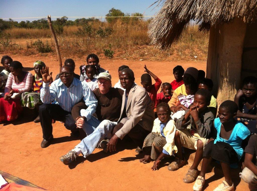 John 414 Missions Chairman with Villagers John 414 Missions Chairman with Villagers
